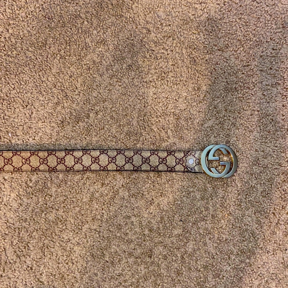 Men’s brown and tan Gucci belt